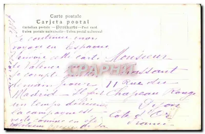 Mulher em vestido com motivos — pose no balcão — editor não identificado — Verso