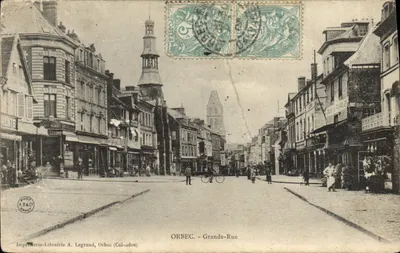 Orbec - Grande-Rue — vue de la rue principale avec édifice à clocher — Imprimerie-Librairie A. Legrand, Orbec (Calvados)