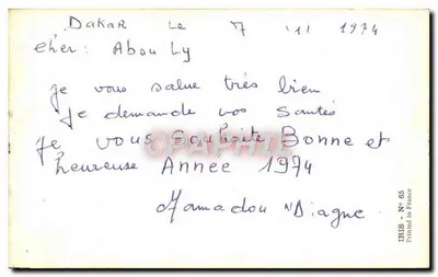 Criança africana — lavando as mãos em um balde — IRIS N° 65 — Verso