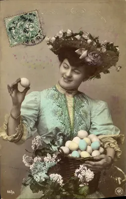 Mulher com chapéu florido segurando um cesto de ovos — NRG 663/1 — Grano-Optypie