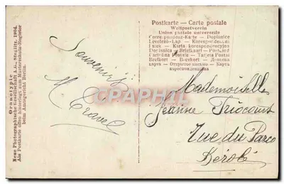 Mulher com chapéu florido segurando um cesto de ovos — NRG 663/1 — Grano-Optypie — Verso