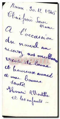 Deux enfants en hiver — scène de neige avec houx et parapluie — éditeur C. C. C. (imprimé sur la carte) — Verso
