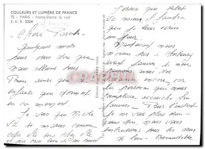 Tarjeta postal moderna París Notre Dame de noche — Reverso