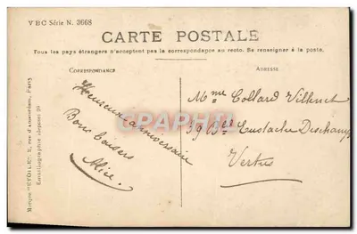 Młoda kobieta w długim stroju i kapeluszu — trzymająca koszyk z kwiatami — wydawca VBC Série N. 3668 — Rewers