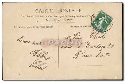 Homem com bigode segurando um cheque — J.E. Paris — n°12 — Verso