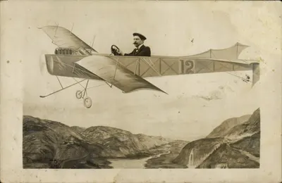 Piloto em avião biplano — número 12 — E. PUTTLET, Foto, 19 Rue Saint-Jean, Lyon