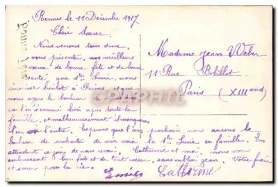 Menina segurando um buquê — Bonne Fête — Verso