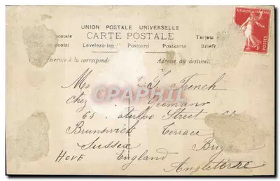 एक युवा महिला फूलों वाले टोपी में — अच्छा वर्ष 1912 — अज्ञात प्रकाशक, संख्या 7094 — पीछे