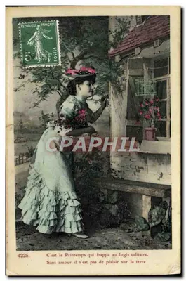 Femme en robe à volants — scène de jardin devant une fenêtre — éditeur 'C. B. L. & Cie' n°4225