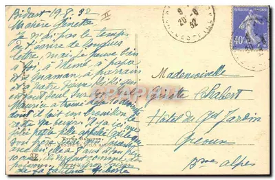 Duas pessoas sob um guarda-chuva — desenho assinado 'A. T.' em 1928 — editor não visível — Verso