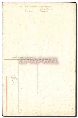Donna in costume da bagno — seduta su una sdraio intrecciata sulla spiaggia — disegno di Hérouard — Verso