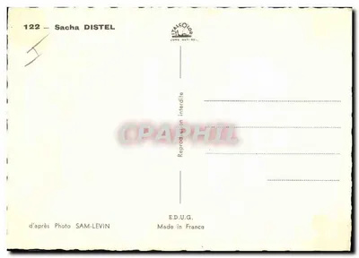 Sacha Distel — uśmiechnięty portret trzymający przędzany przedmiot — Wydawnictwo D.U.G. — Rewers