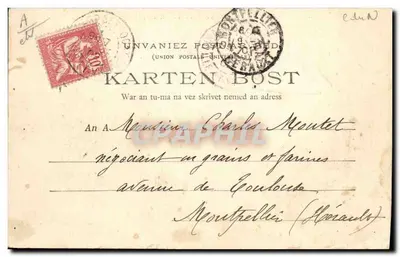 M. en Mevrouw Botrel aan de voet van het Kruis van Port-Blanc — Bretagne (Collectie E.H.) — Foto van M. de Graaf Alain de la Tont — Achterkant