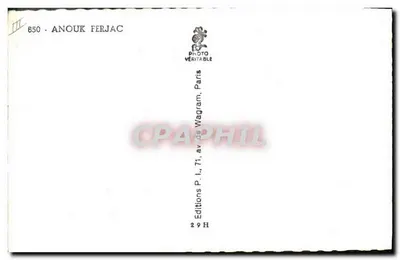 Uśmiechnięta kobieta — przed murkiem z kamieni i metalową bramą — Bernard-Vauchair, Rue Caumartin, Paryż 9e — Rewers
