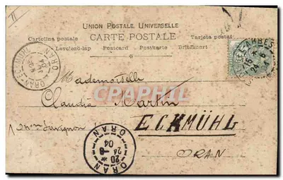 Vrouw in avondjurk — voor een grote letter 'M' — uitgever Perret & Cie, Parijs, n° 87/15 — Achterkant