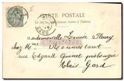 Donna in abito blu che regge dei lis — collezione 'Le LYS' — Fotografo A. Brabant & Cie, Parigi — Verso
