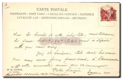 Mulher jovem com chapéu decorado com flores — Ano 1909 — M. M. Vienne, Nr. 380 — Verso