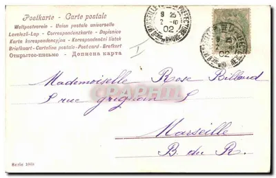 Dziewczyna siedząca na krześle — zdjęcie z warsztatu — seria 1068, wydawca Buthe — Rewers