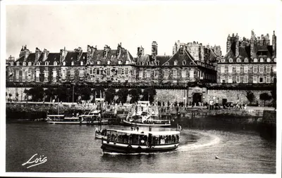 Saint-Malo — Domy Korsykańskie dominujące nad murami — Wiatraki wyruszające w kierunku Dinard — wydawca Laurent-Nel, nr 1380